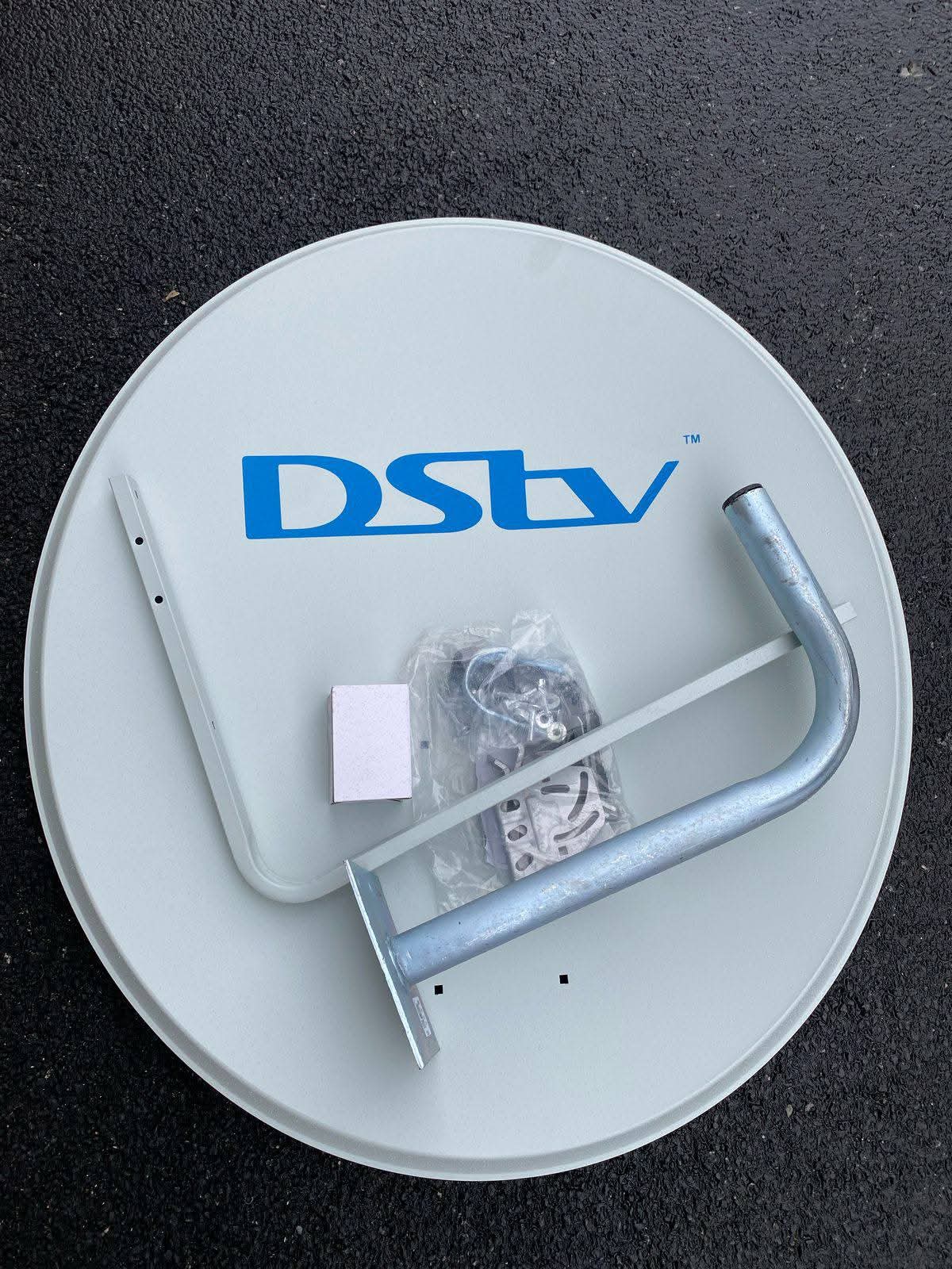 DStv satellite dish mounted on brick chimney in Durban
